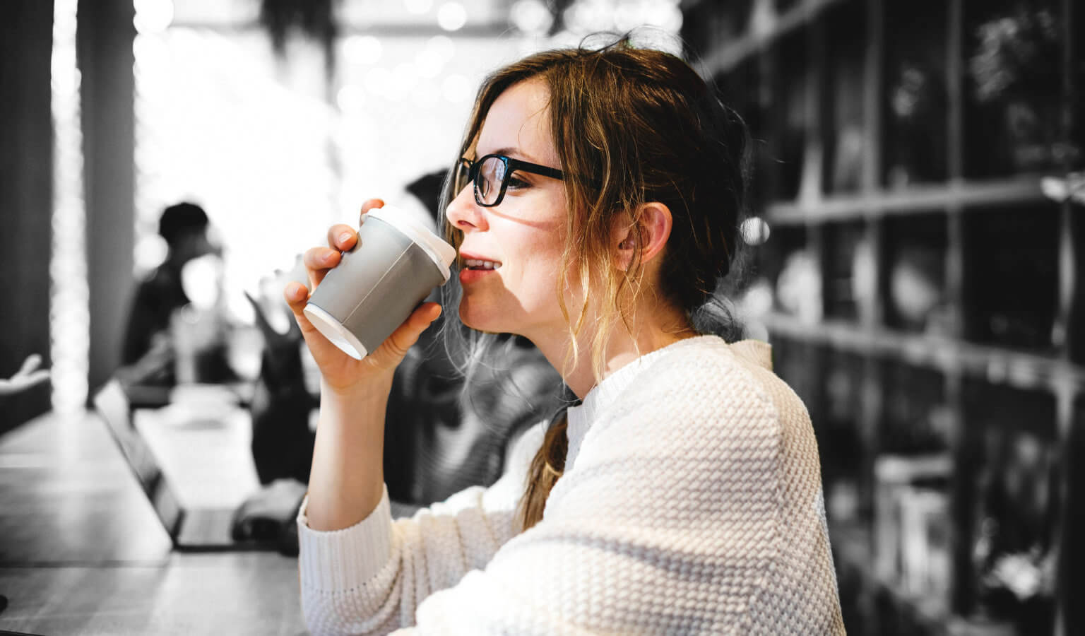 become a freelance web developer photo of lady drinking coffee